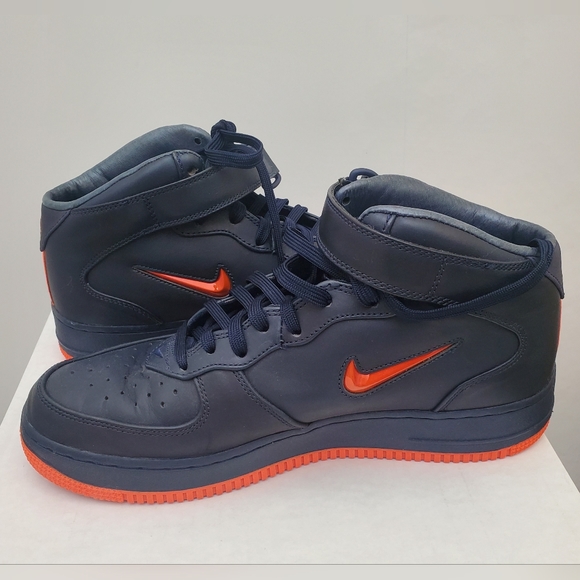 Nike Air Force Sneakers – Dark Blue with Orange Swoosh Logo